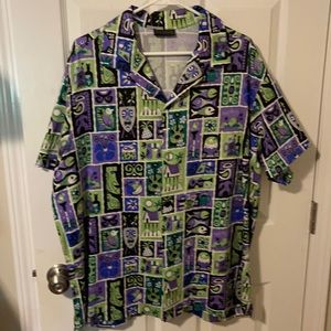 Hard to find purple tiki print shirt by pinup girl